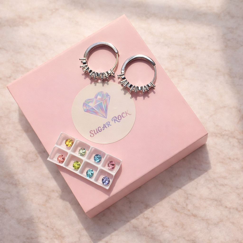 Hoop earrings with gemstones on a pink display card with 'SUGAR ROCK' branding.